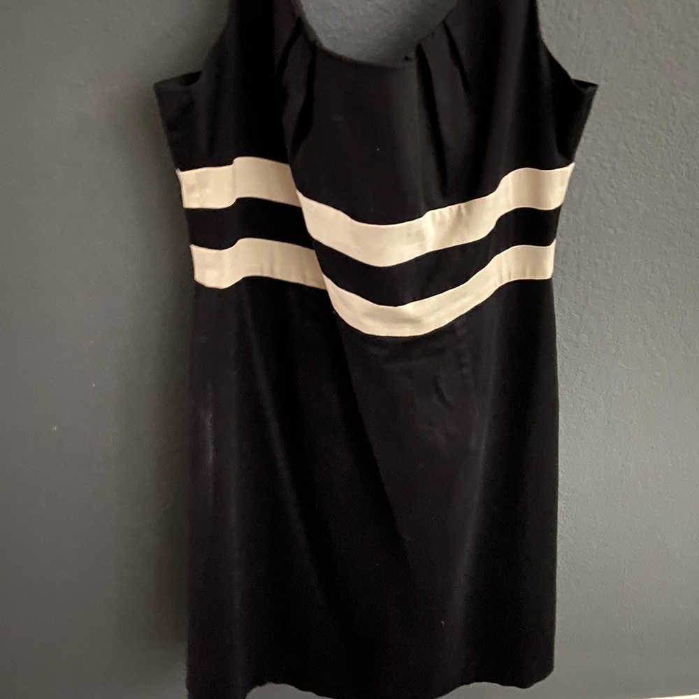 Black dress with white stripes